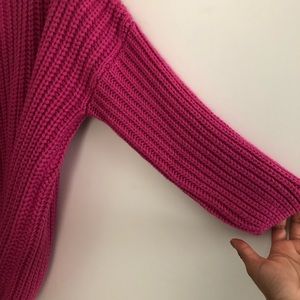 Magenta pink sweater.